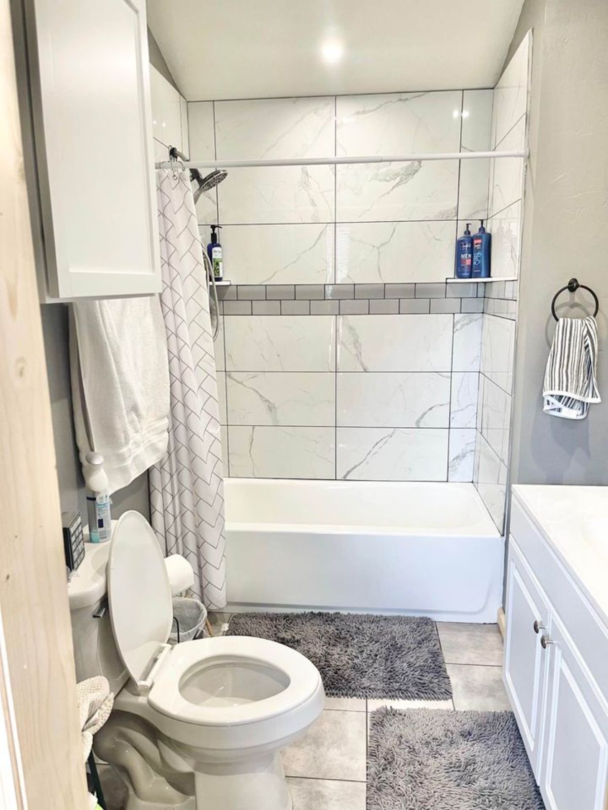 Toilet and bathtub in washroom of 42’ Tiny House