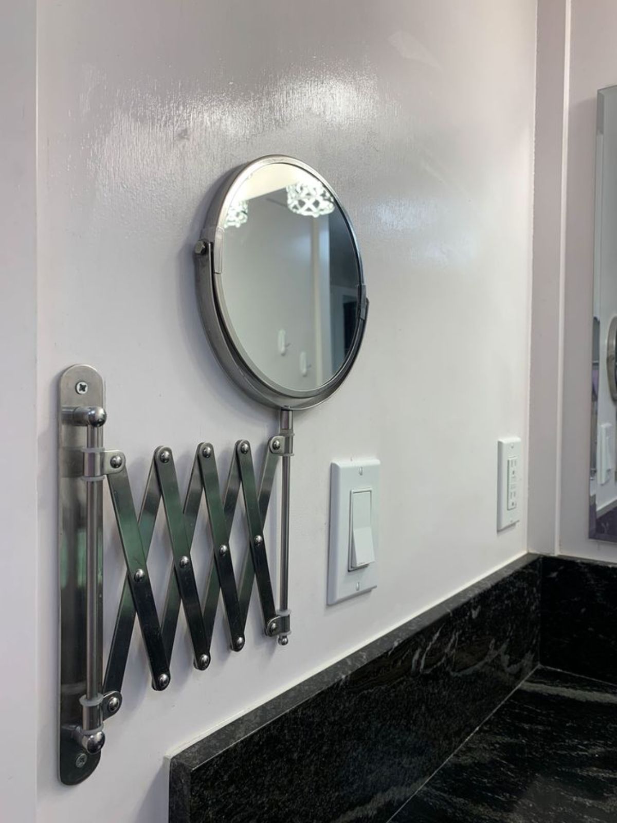 Mirror in bathroom of 34’ Tiny Home on Wheels