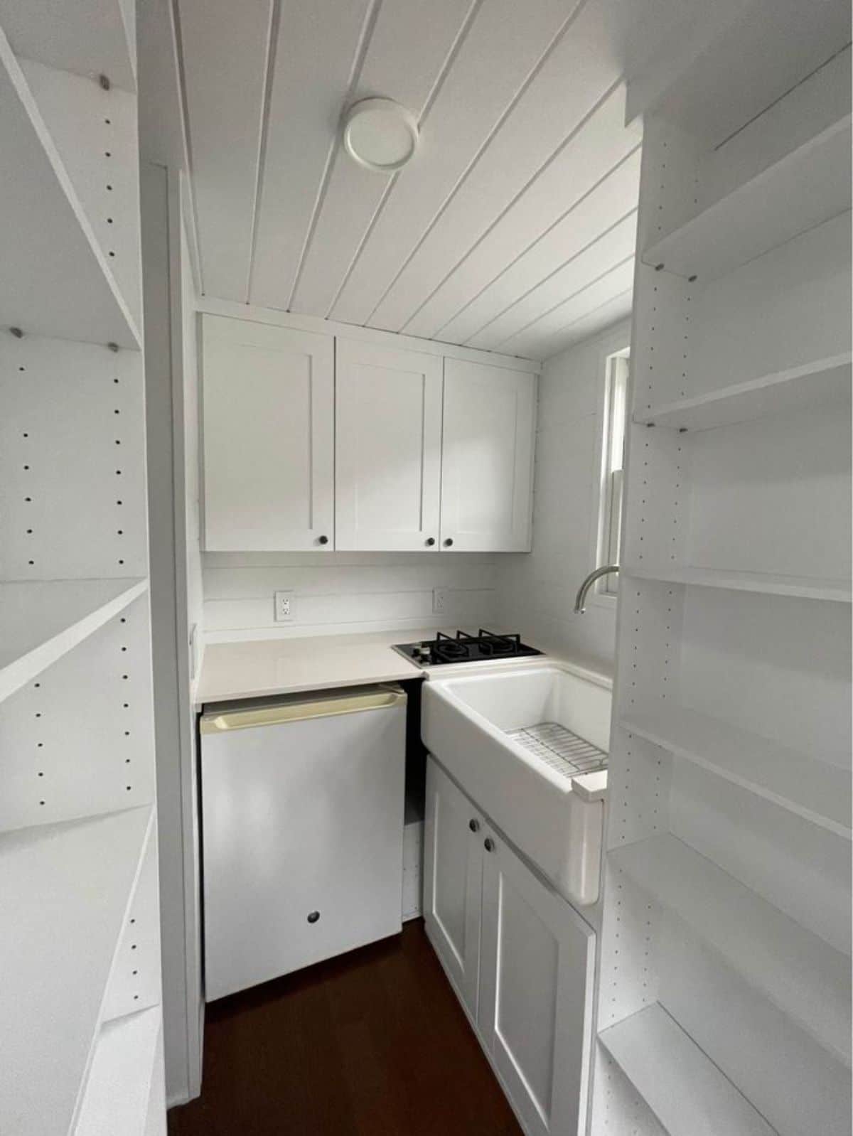 Compact kitchen of Tiny House on Wheels