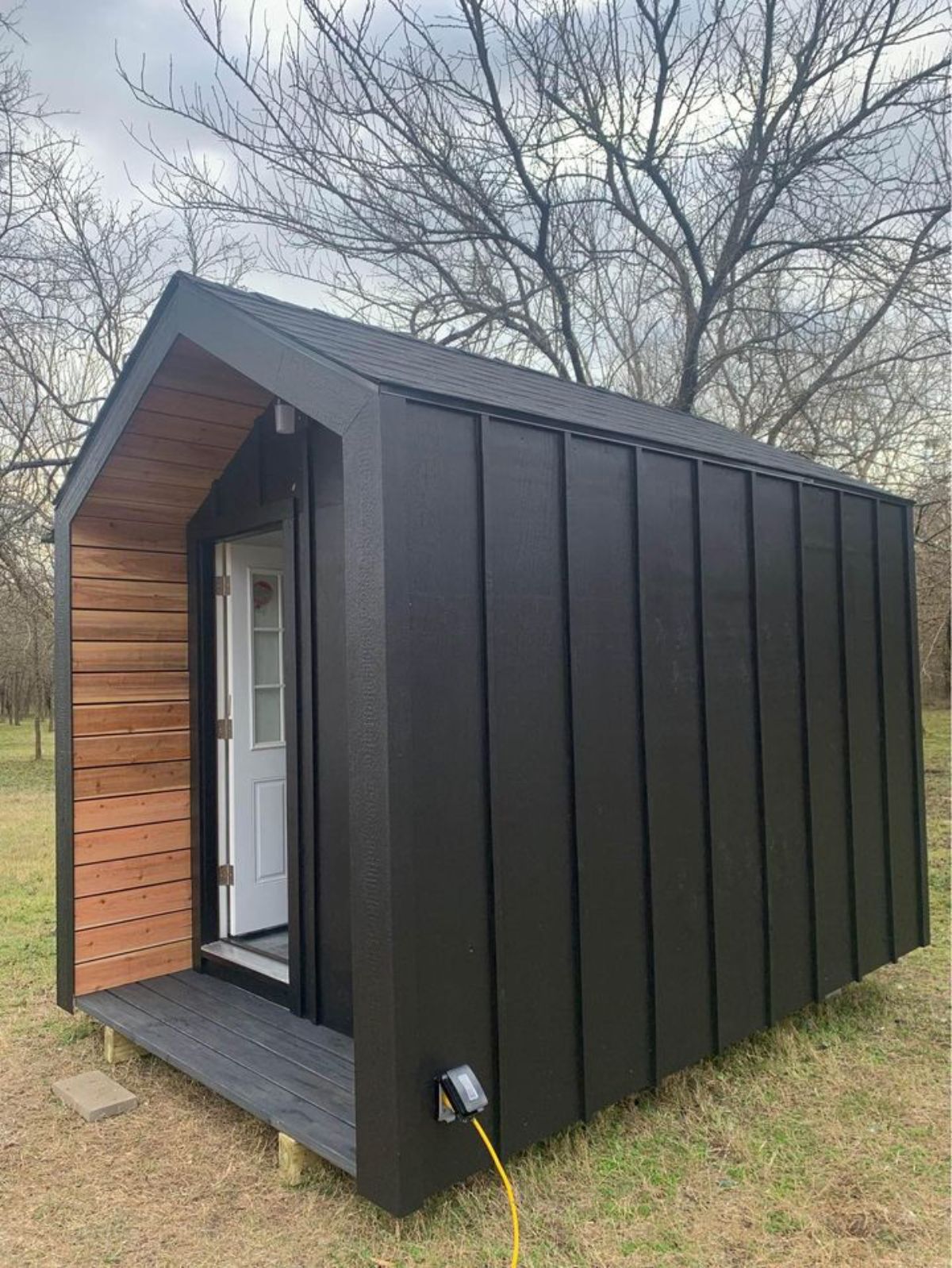 Black Wooden exterior of Tiny Cabin Office