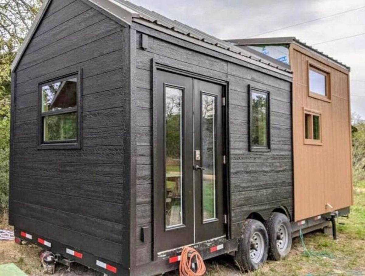 Front view of Cozy 23’ Tiny House on Wheels