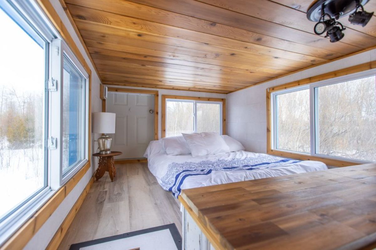Leg side view of Spacious bedroom of custom tiny home