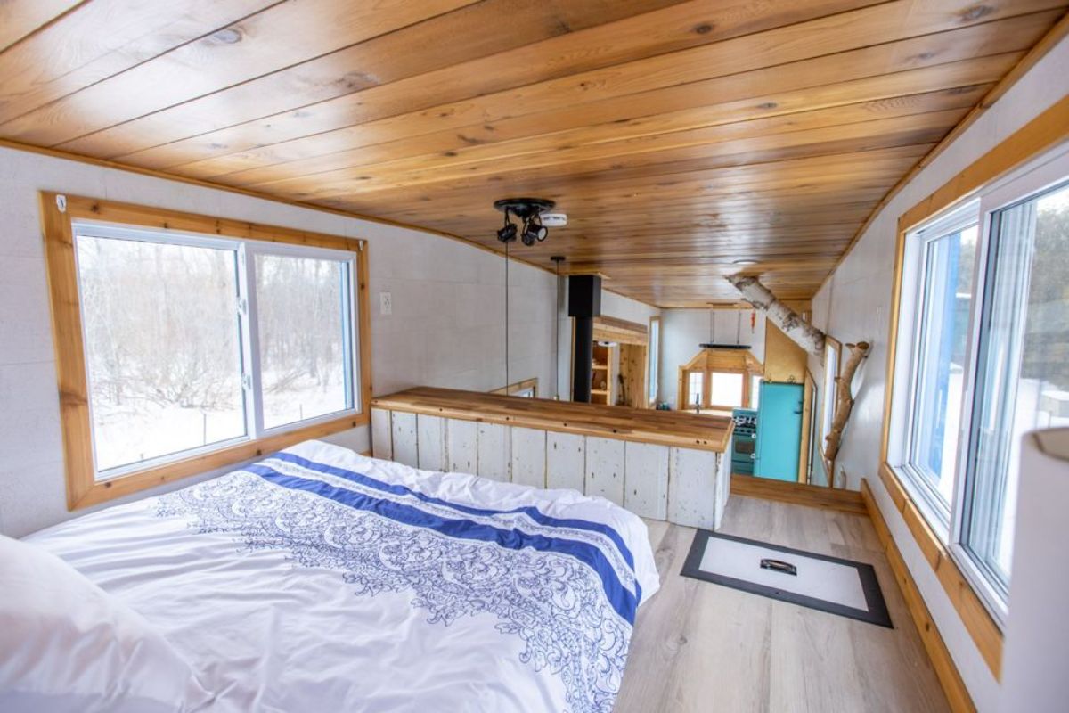 Head side view of Spacious bedroom of custom tiny home