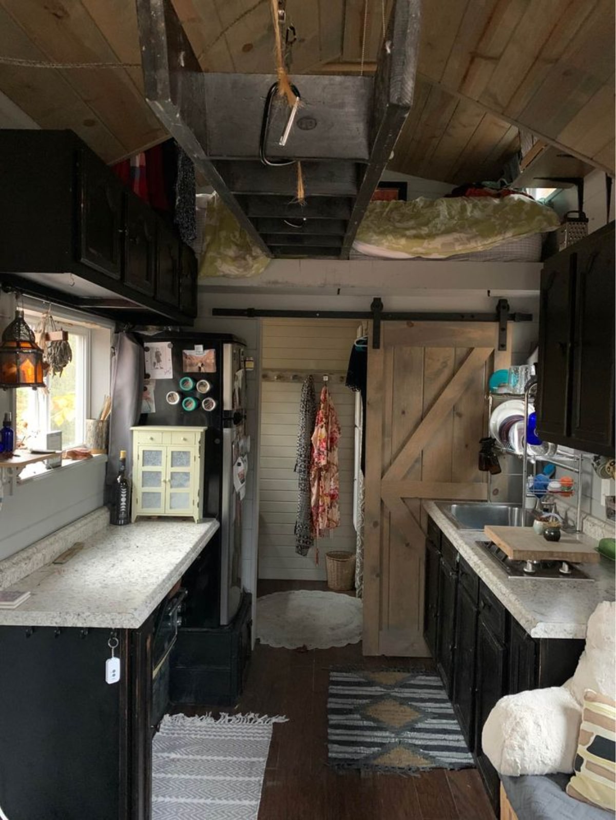 Space of 180 sf Adorable Tiny House on Wheels is well utilized