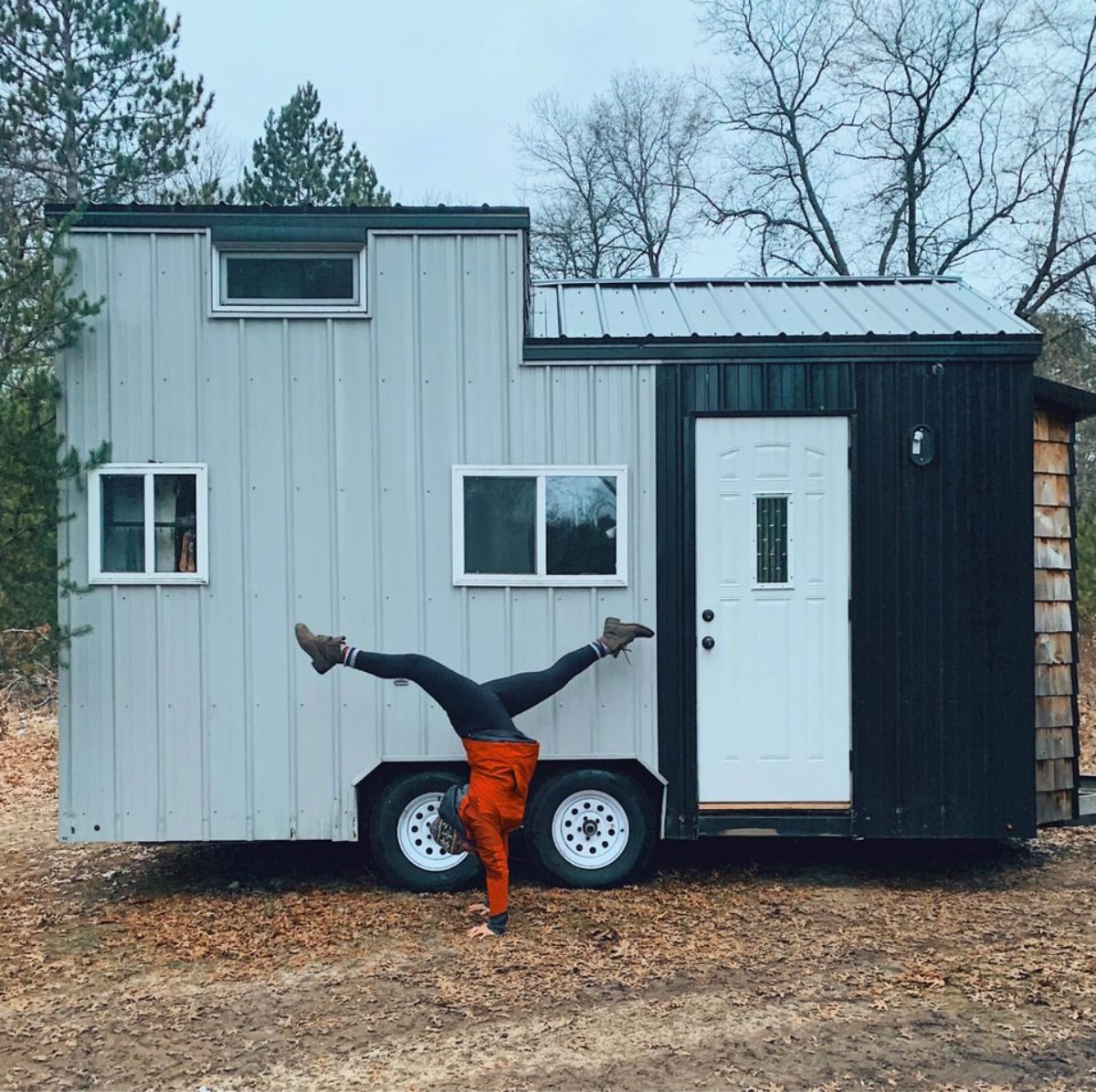 Main entrance of 180 sf Adorable Tiny House on Wheels from outside