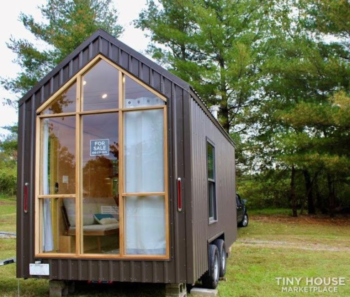 Amazing glass wall exterior of 221 sf Beautiful Tiny Home
