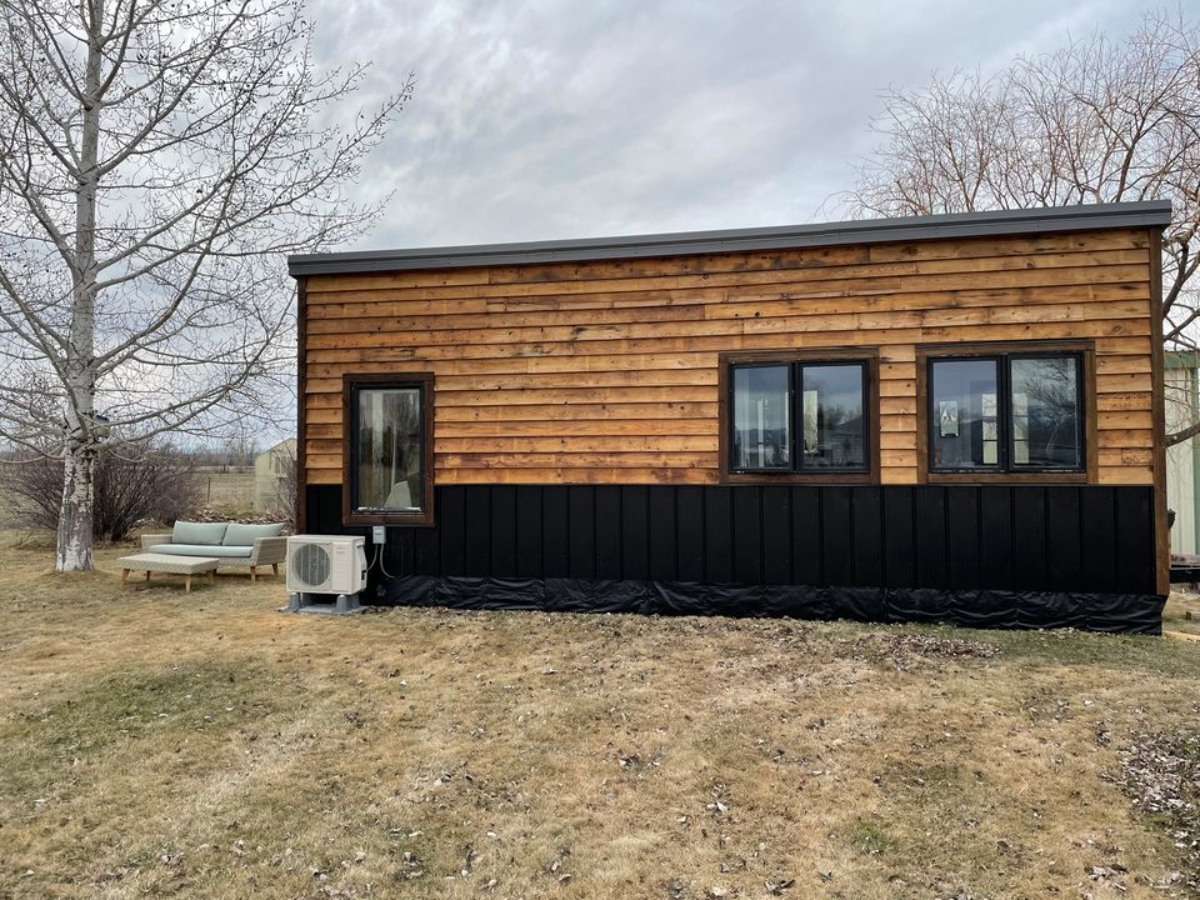 Wooden exterior of 30’ Tiny House on Wheels