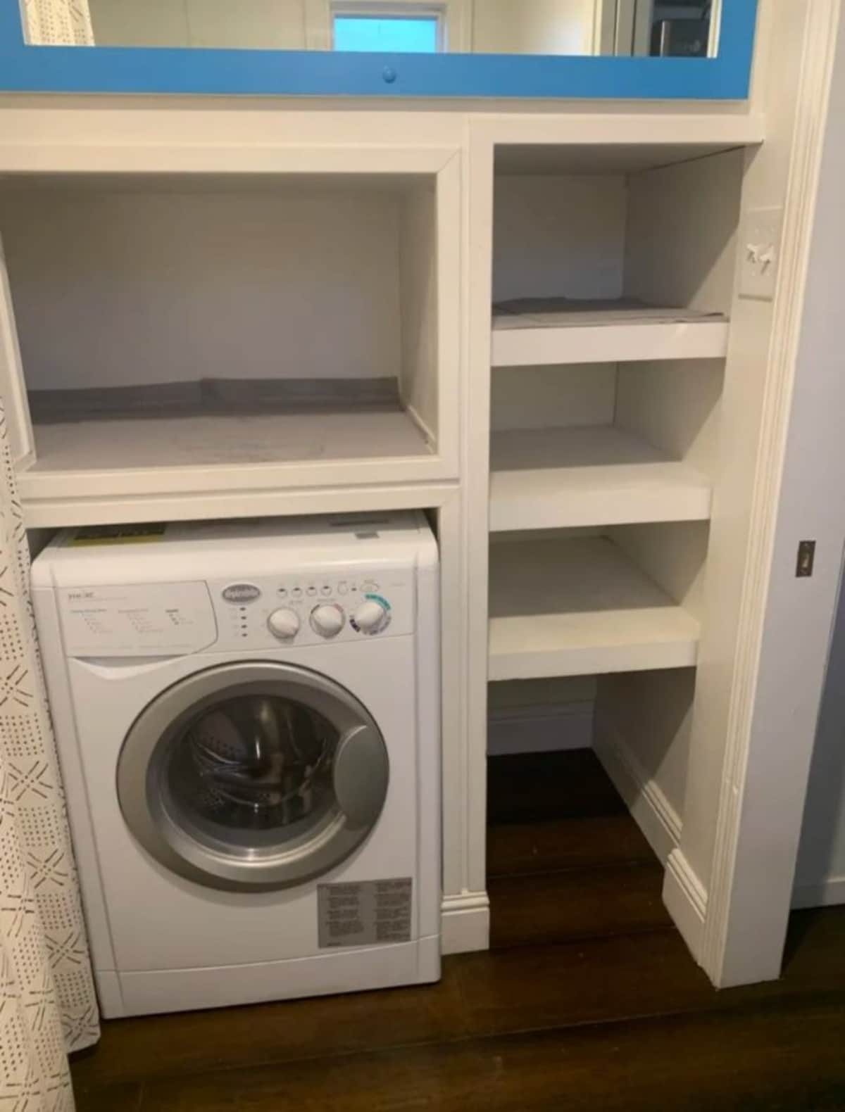 Lots of storage and washer dryer at 22' Custom Tiny House