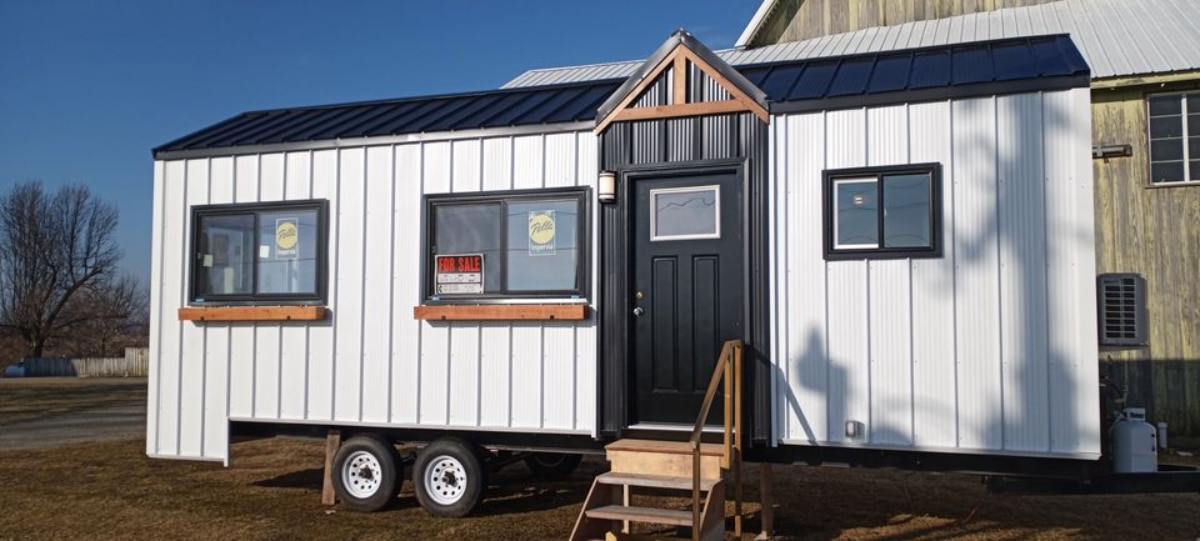 Stunning main entrance of 27' Tiny Home on Wheels from outside