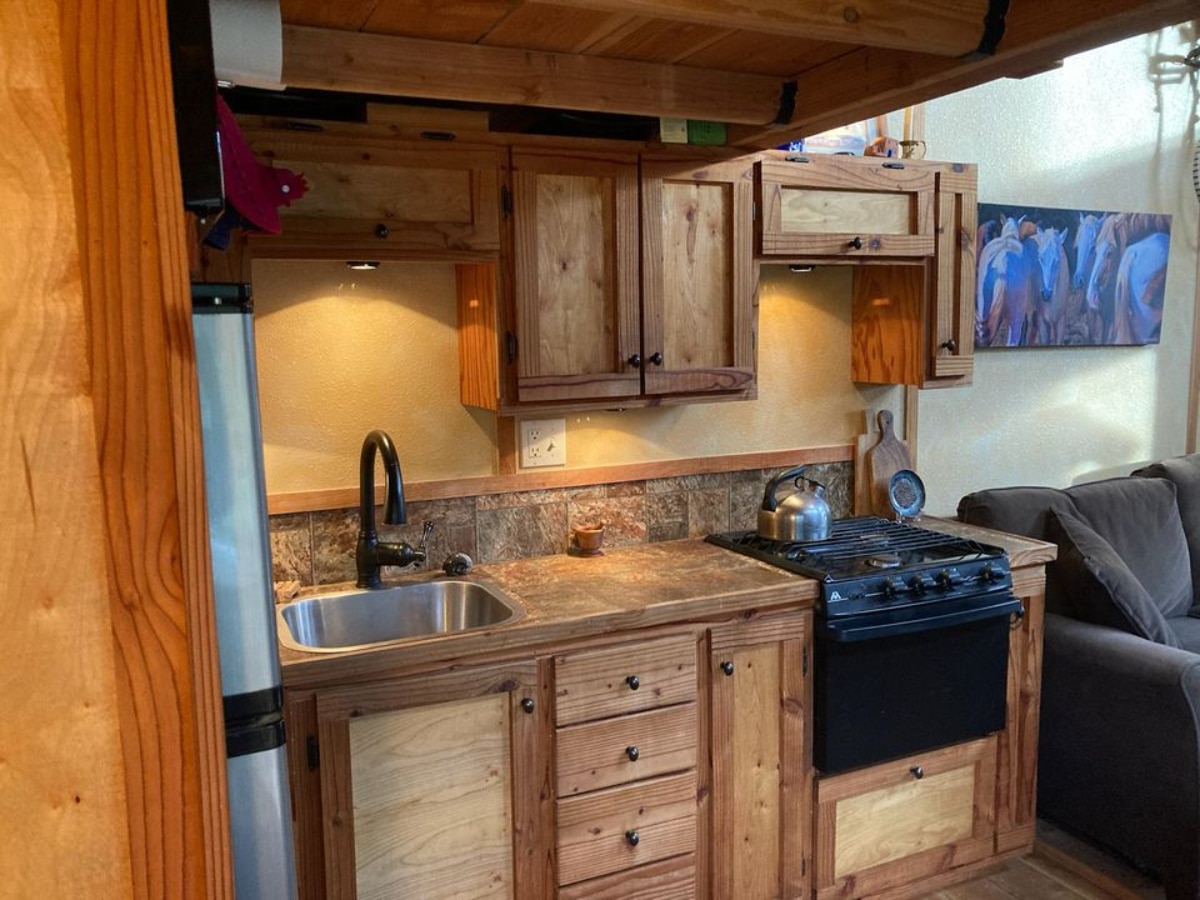 Well equipped kitchen area of 270 sf Tiny Home