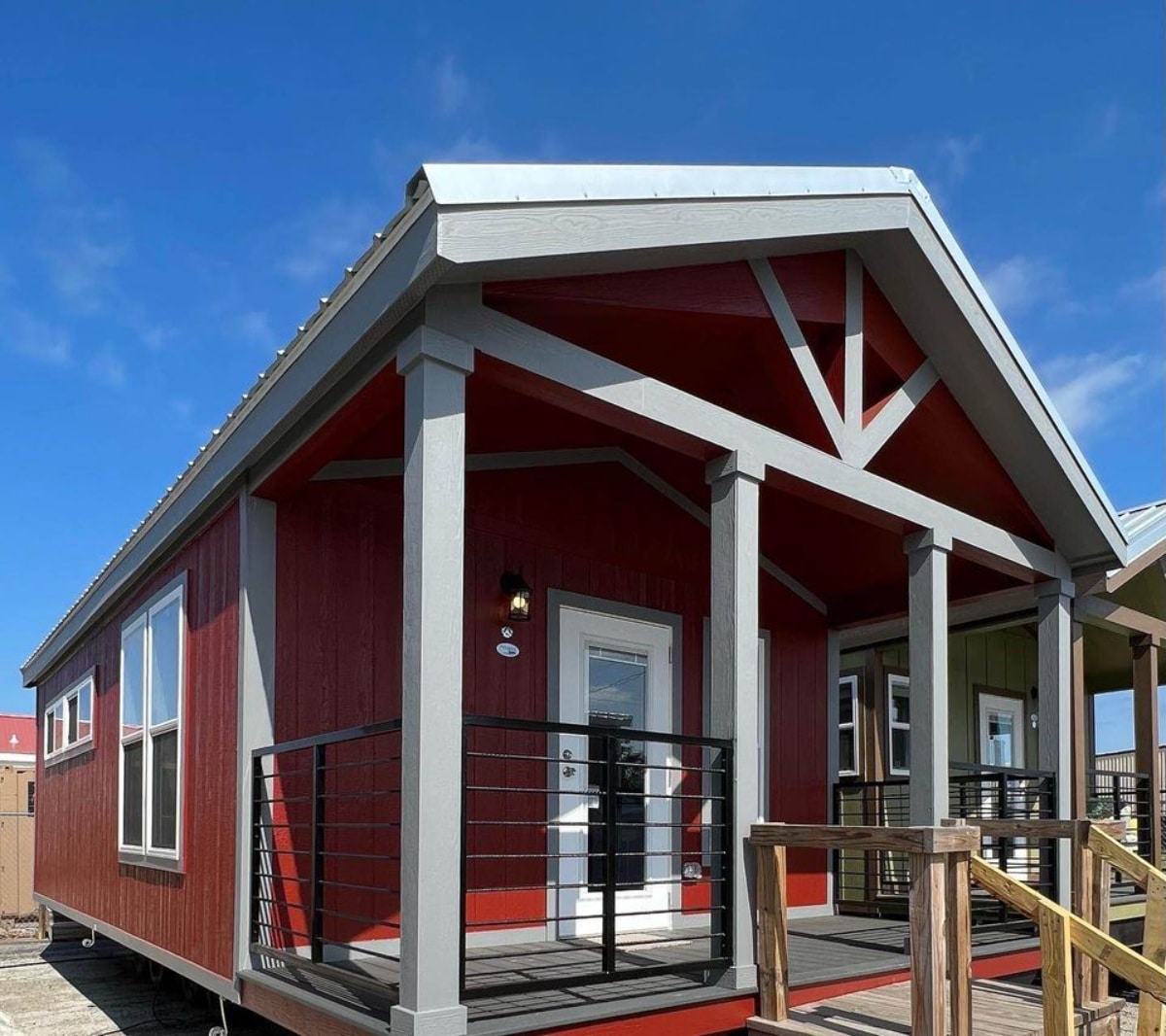 Red exterior of 32' Ranch Style Tiny Home from outside