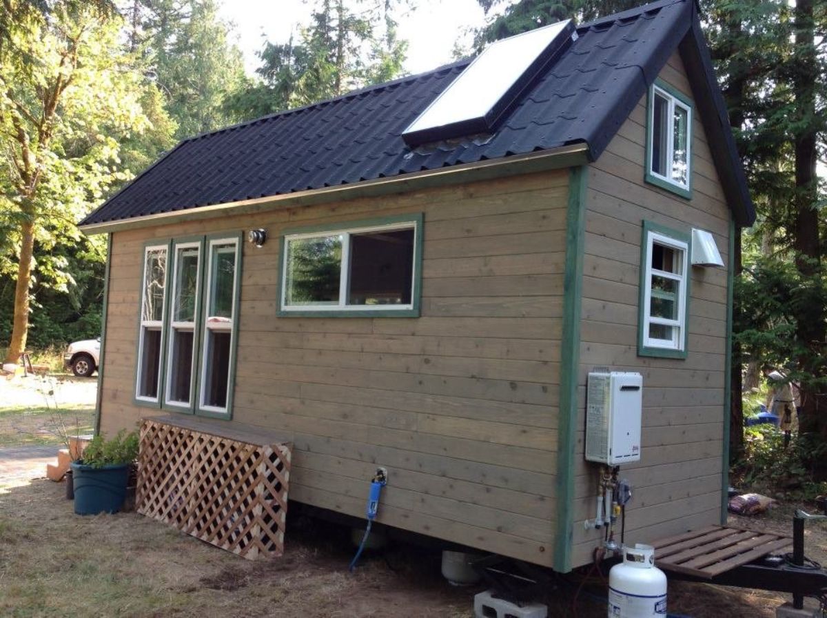 Brown and blue themed exterior of 18' Tiny Home
