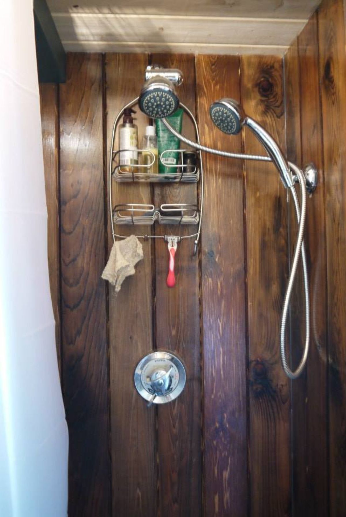 Wall mounted shower in bathroom of 18' Tiny Home