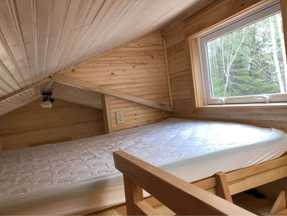 Loft bedroom has a comfortable mattress, huge windows and impressive height makes it brighter
