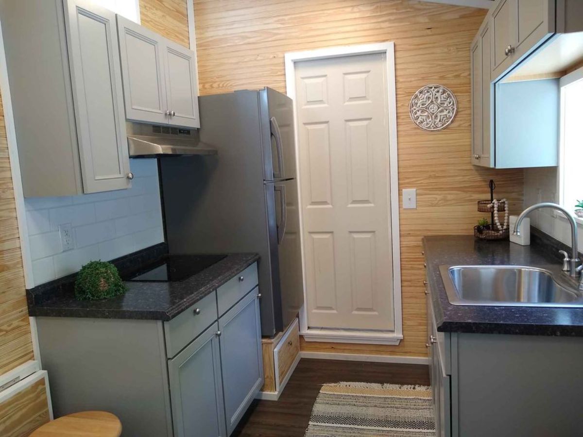 Kitchen area of 24’ One Bedroom Tiny House has all the stunning amenities
