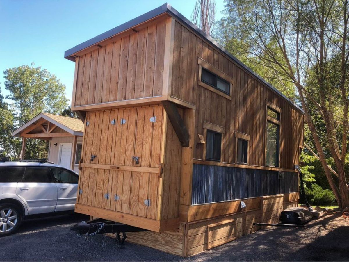Foam Insulated Wooden exterior of 24’ Rustic Tiny House On Wheels suitable for all season