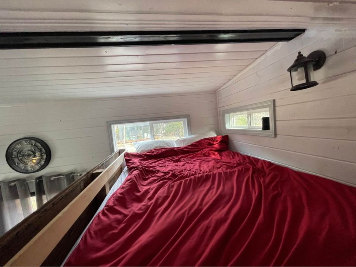 Loft above the living room has a bed