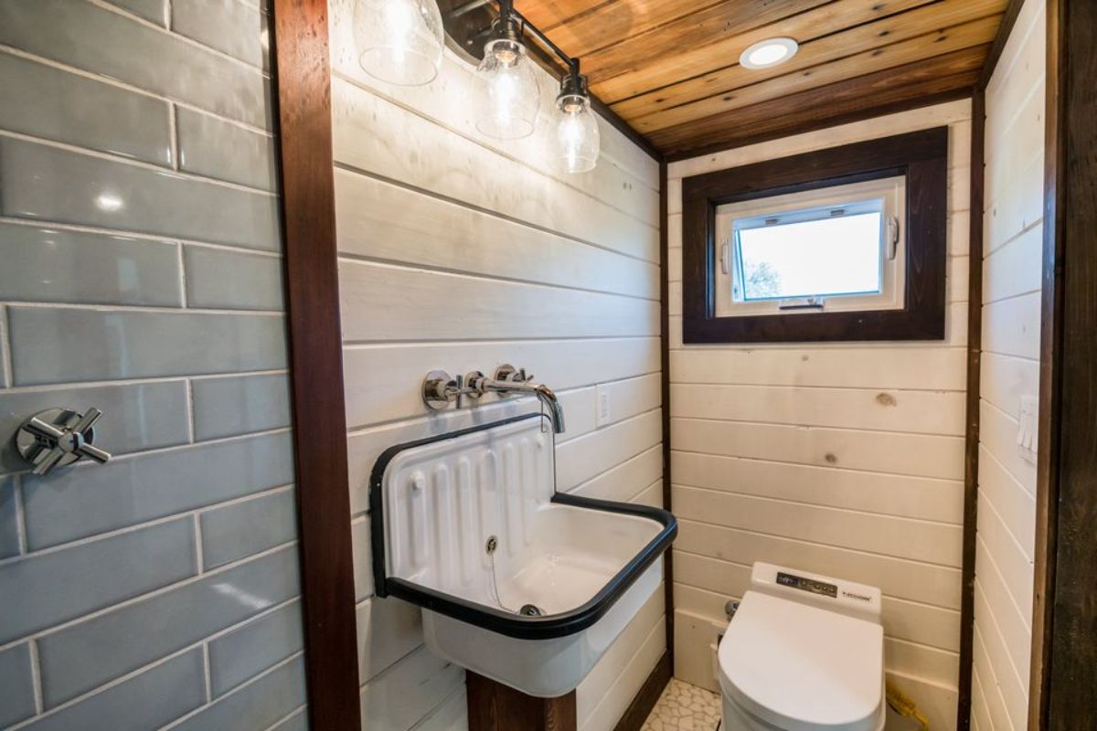 Sink and toilet of 26' Luxury Tiny Farmhouse