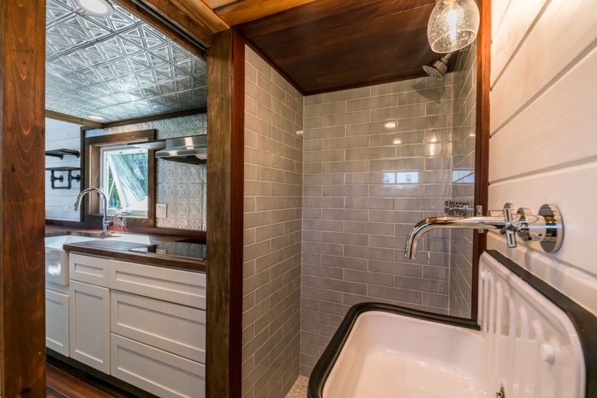 Shower area in bathroom of 26' Luxury Tiny Farmhouse