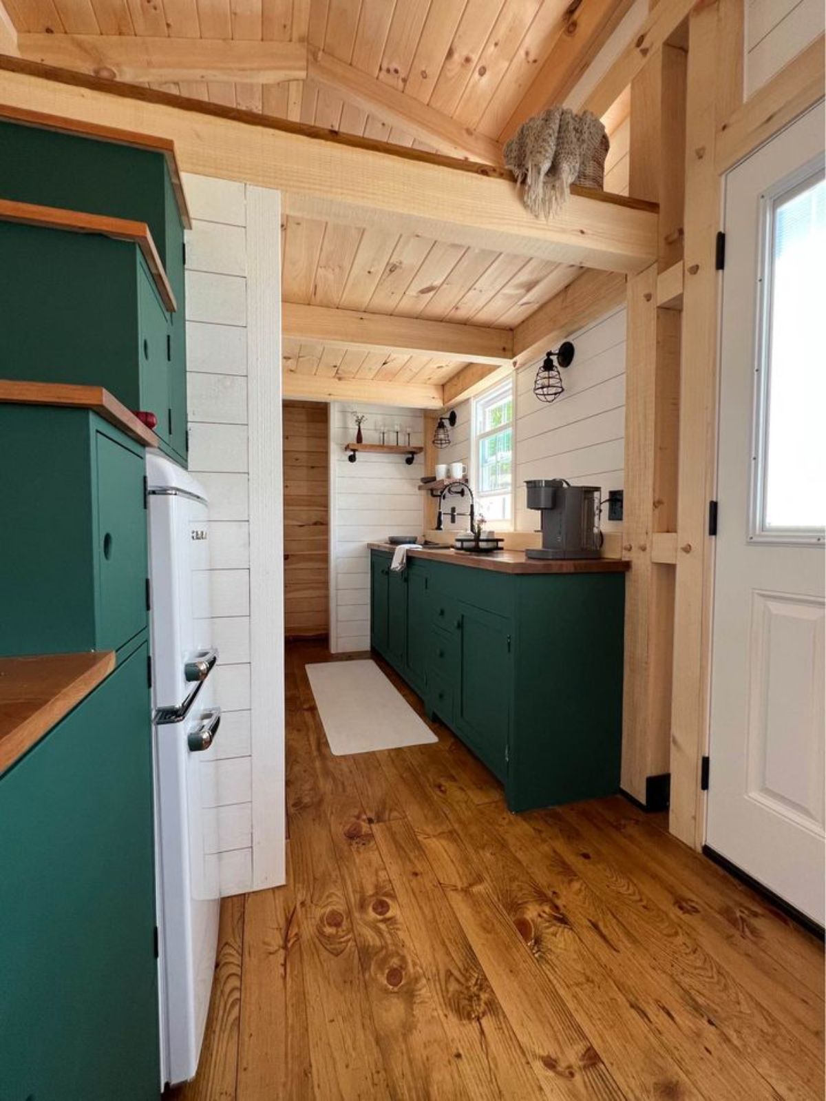 green themed kitchen of 26’ Timber Framed Tiny House
