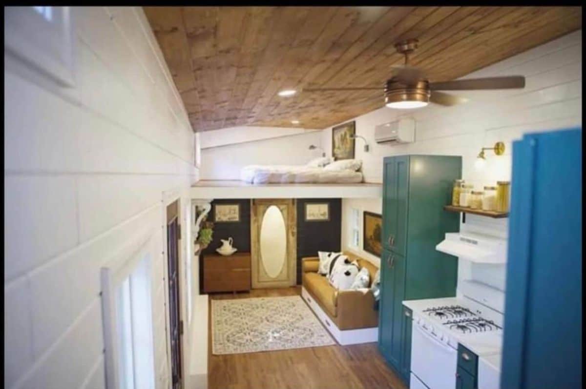Loft bedroom is above the bathroom area of 450 sf Tiny Home