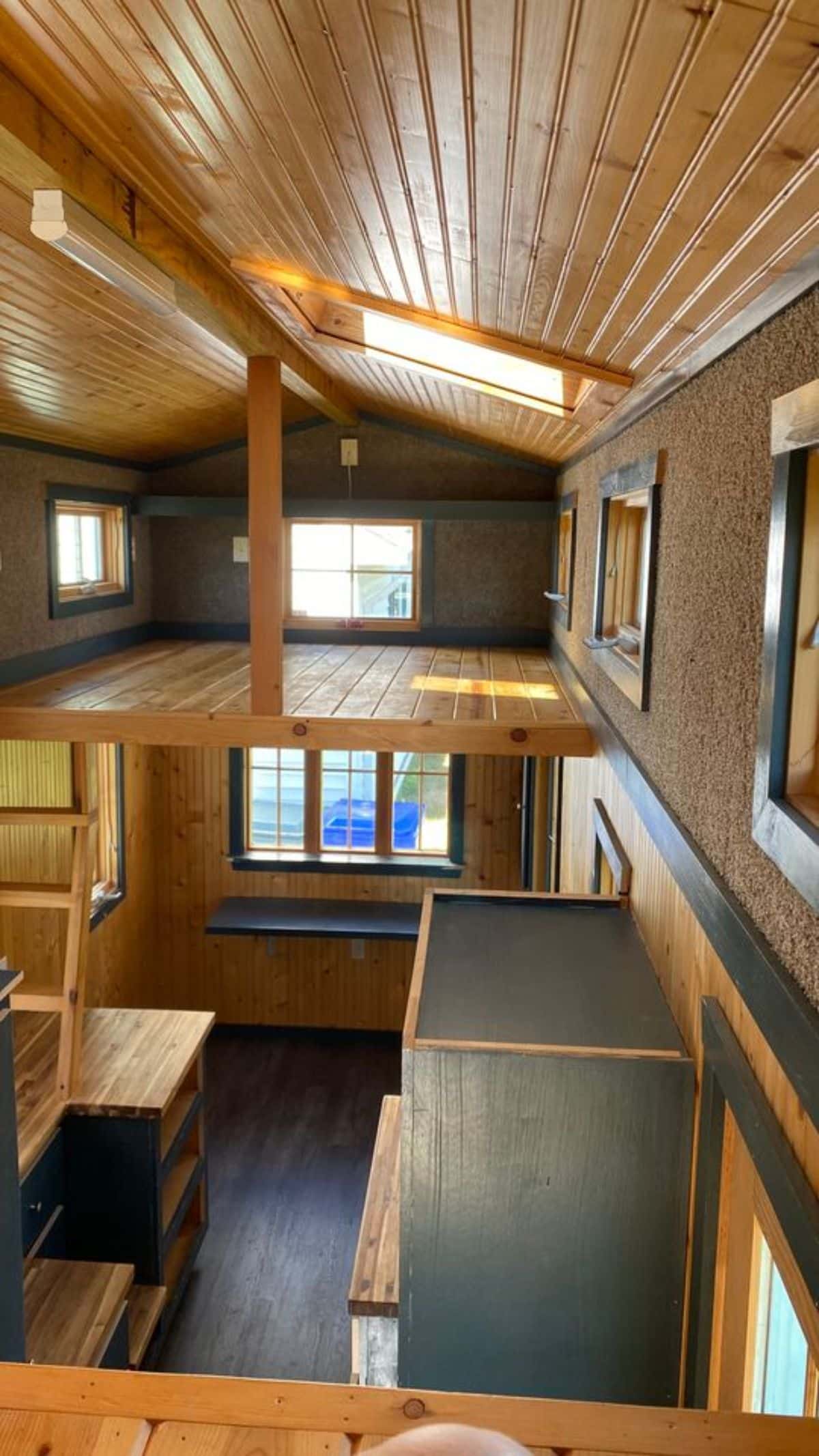 Loft 1 of 20’ Cozy Tiny House is above the living area