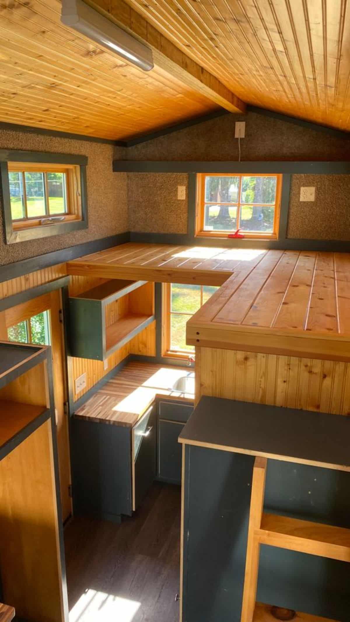 Loft 2 of 20’ Cozy Tiny House is above the kitchen area