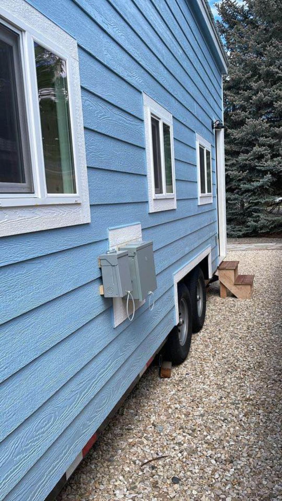Blue Exterior of 20’ Tiny House