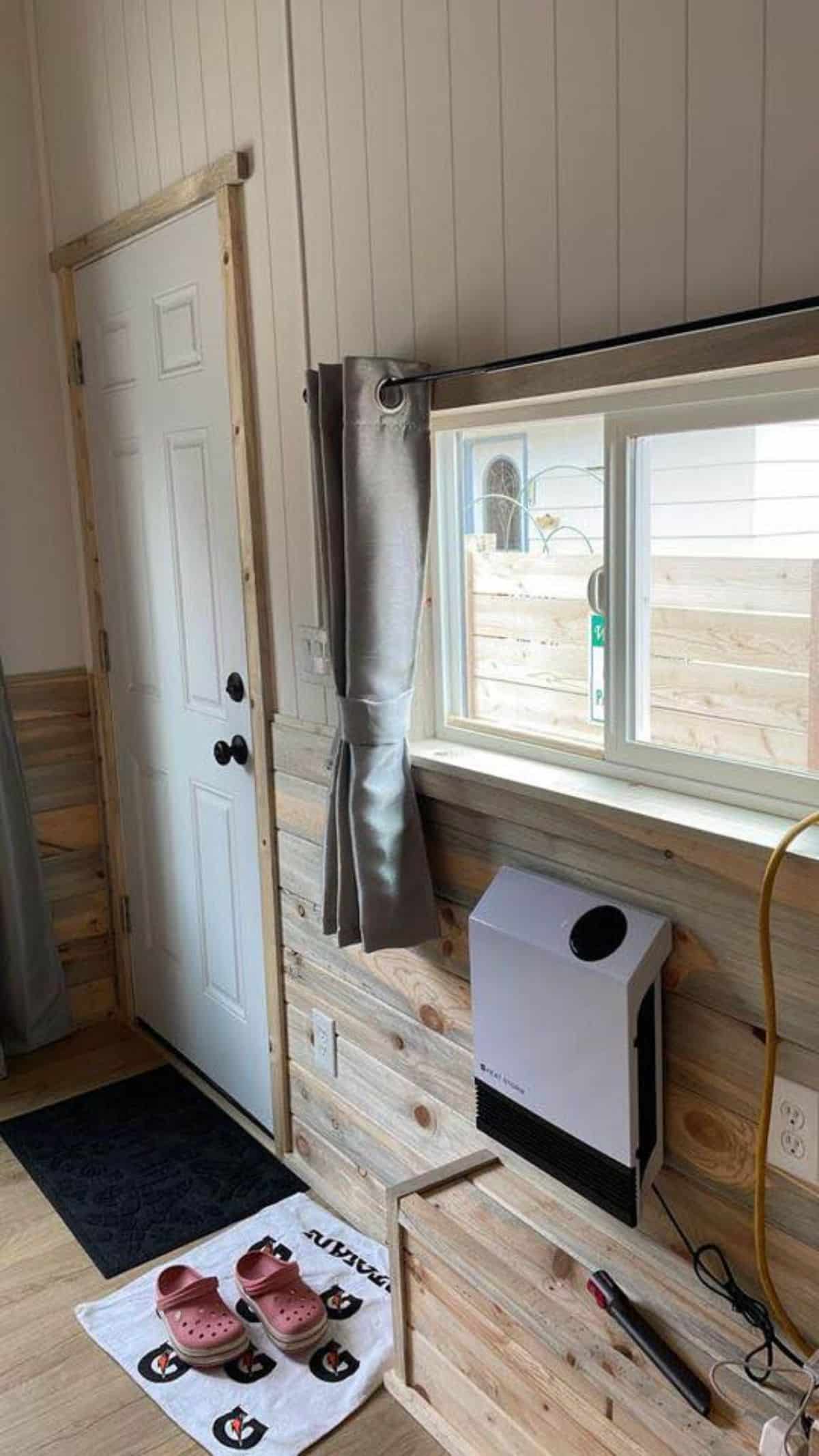 Living area opposite to main door of 20’ Tiny House
