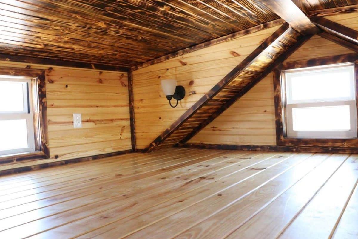 Loft bedroom of 24’ Tiny Cabin in Missouri