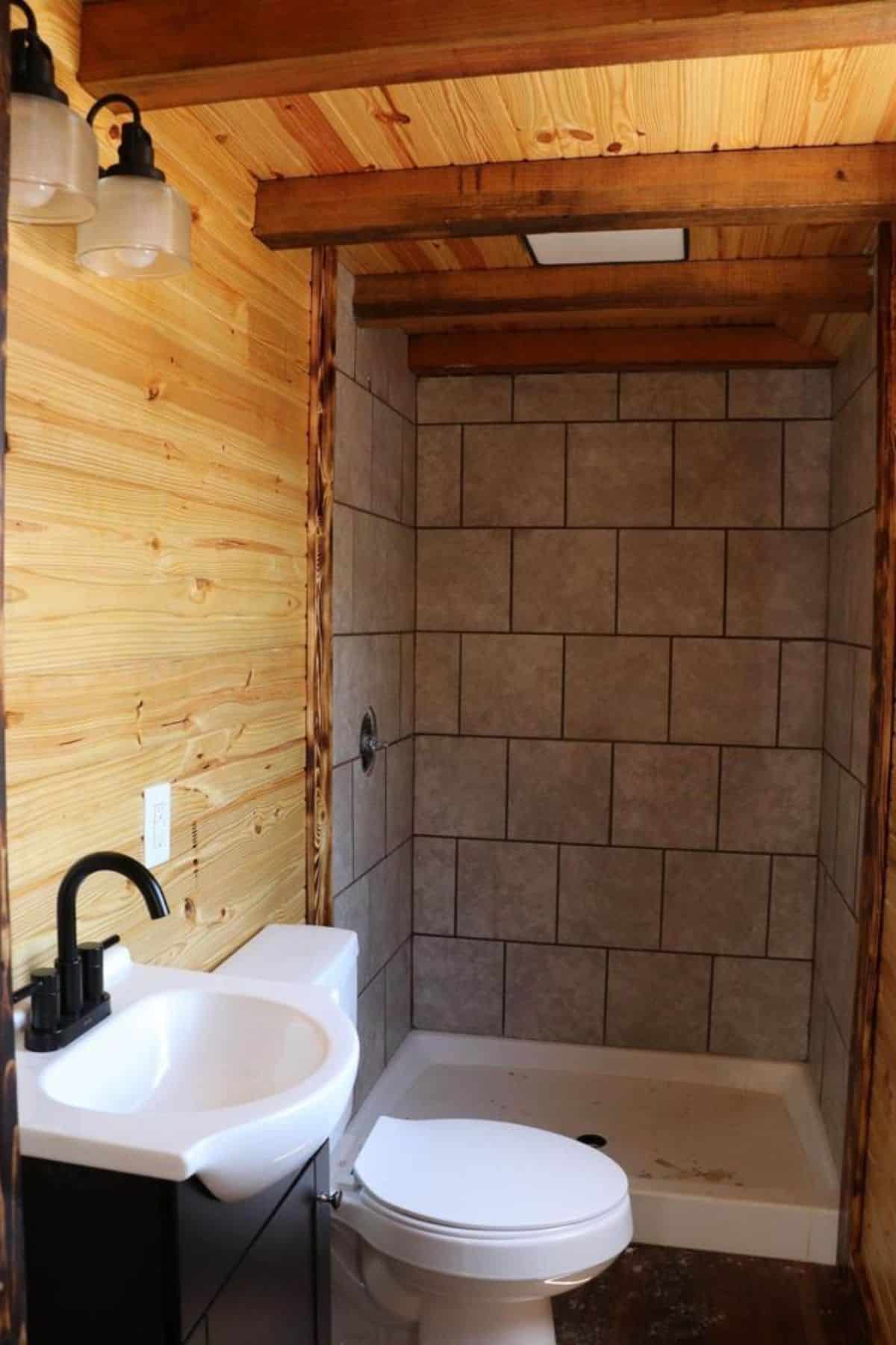 Bathroom area of 24’ Tiny Cabin in Missouri