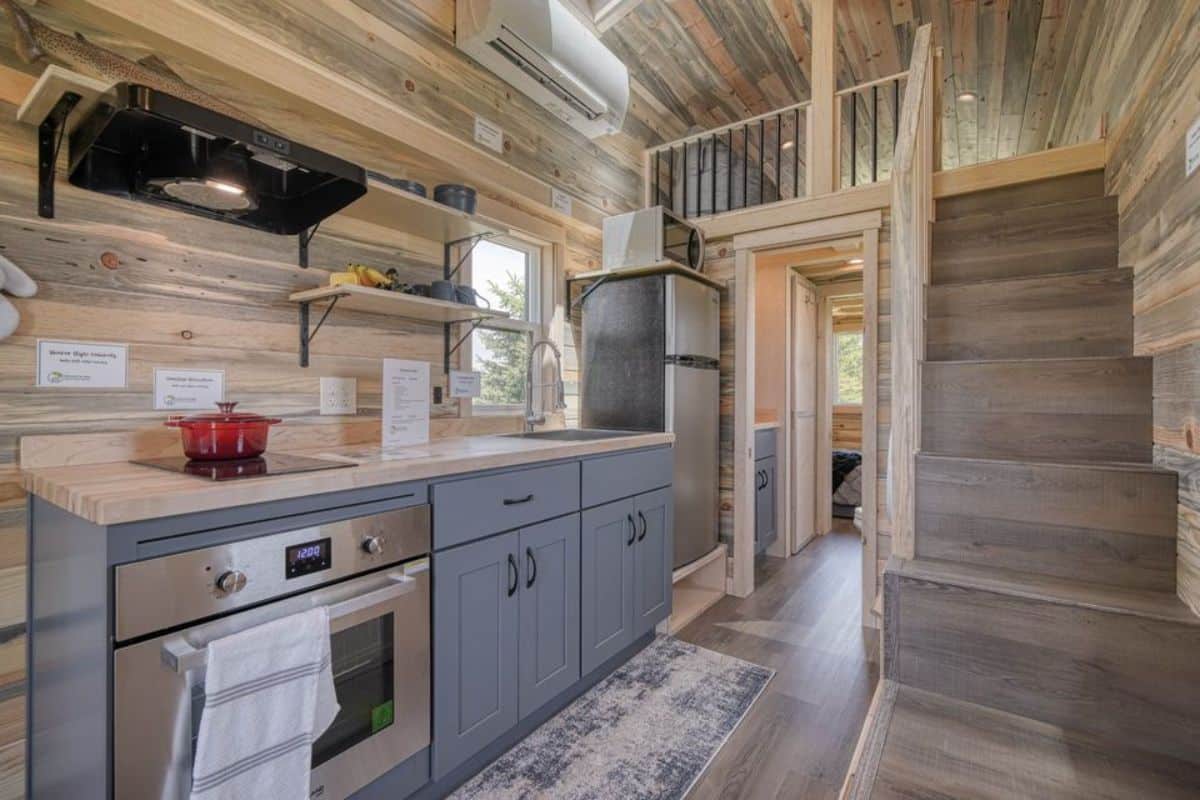 Kitchen area of 30’ Tiny Home is well organized and furnished with all the essential equipment's and storage