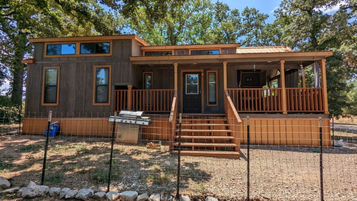 Stunning main entrance view of 399 sf Park Model Tiny House