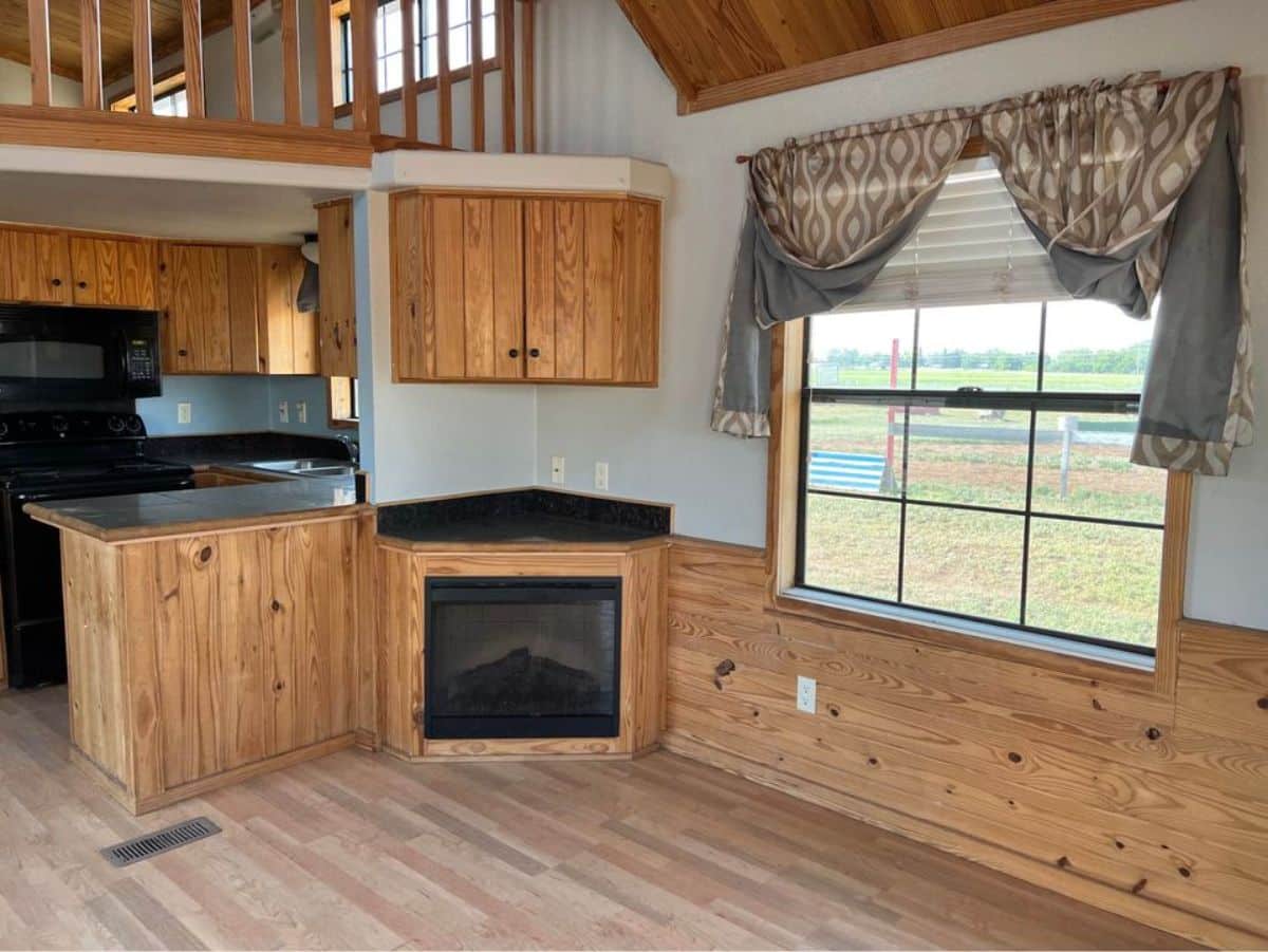 Living area of 40’ Tiny Home can accommodate a couch and a center table