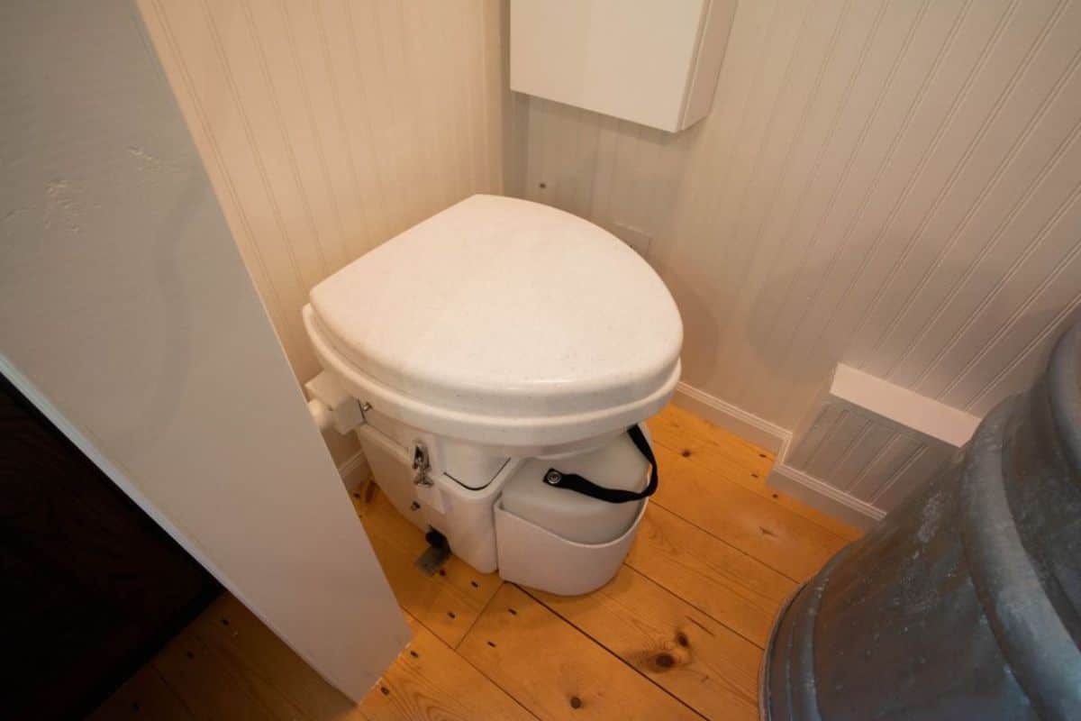 Standard toilet in bathroom of 20’ Tiny House