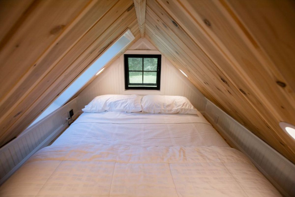 Loft bedroom of 20’ Tiny House has a  queen mattress