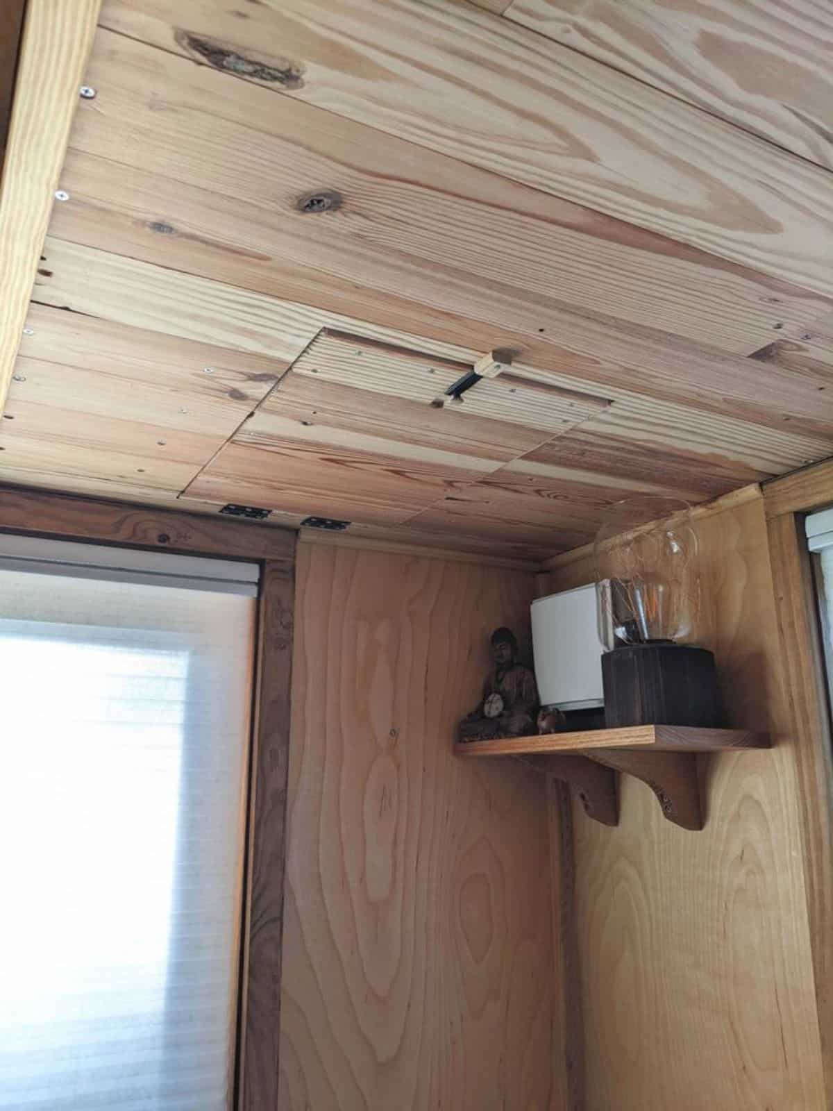 Wooden walls of 24’ One Bedroom Tiny House