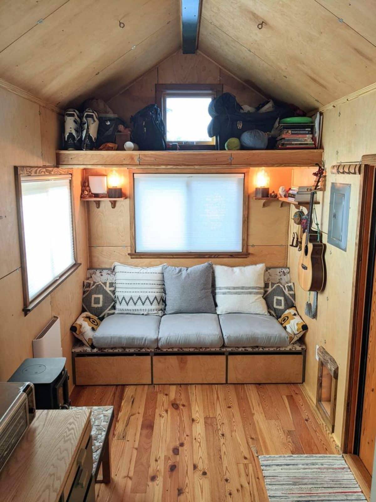 Stunning living area of 24’ One Bedroom Tiny House