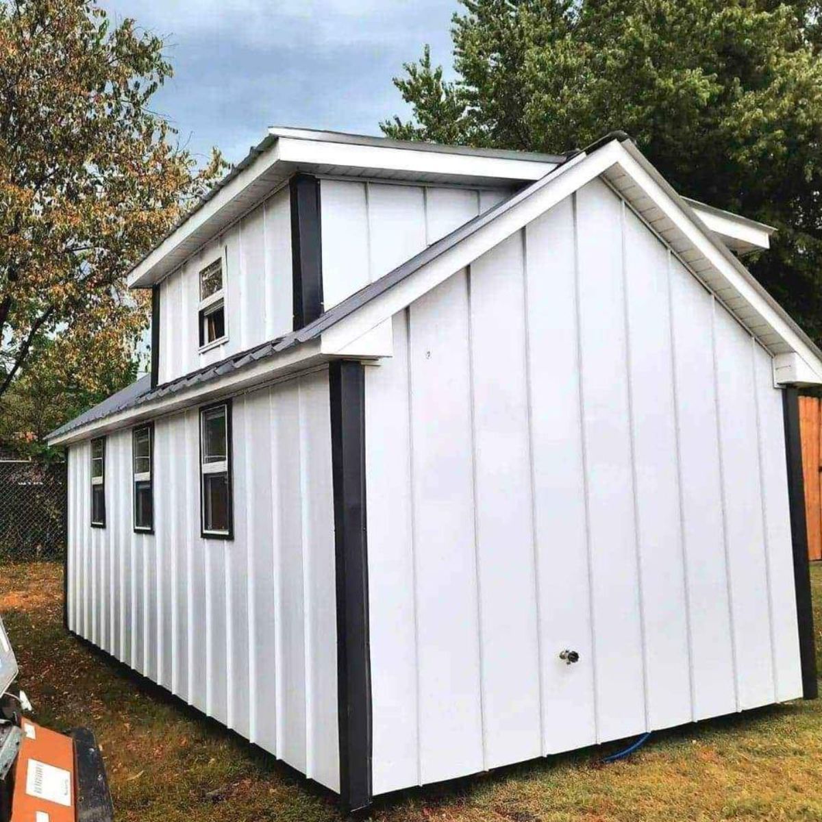White exterior of 24’ Tiny Cabin