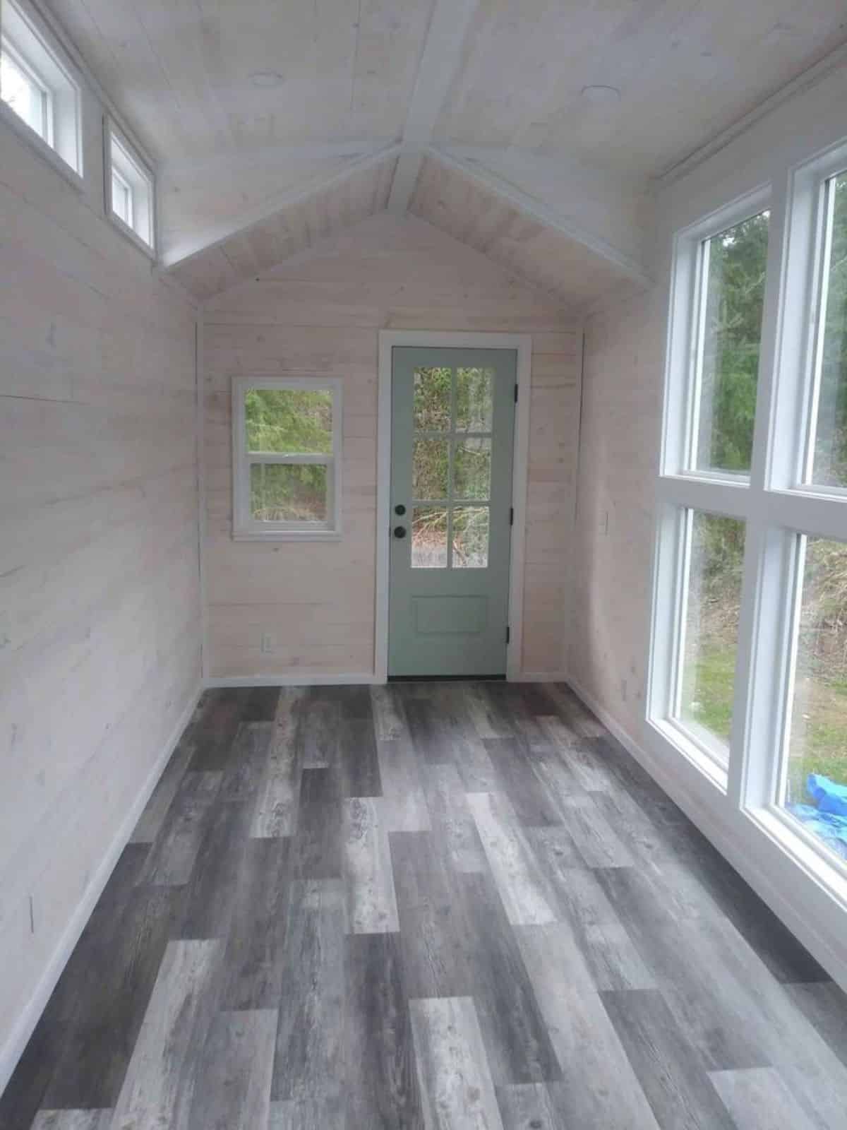 White Interiors of 24’ Tiny House Can Be Your Studio or Workspace