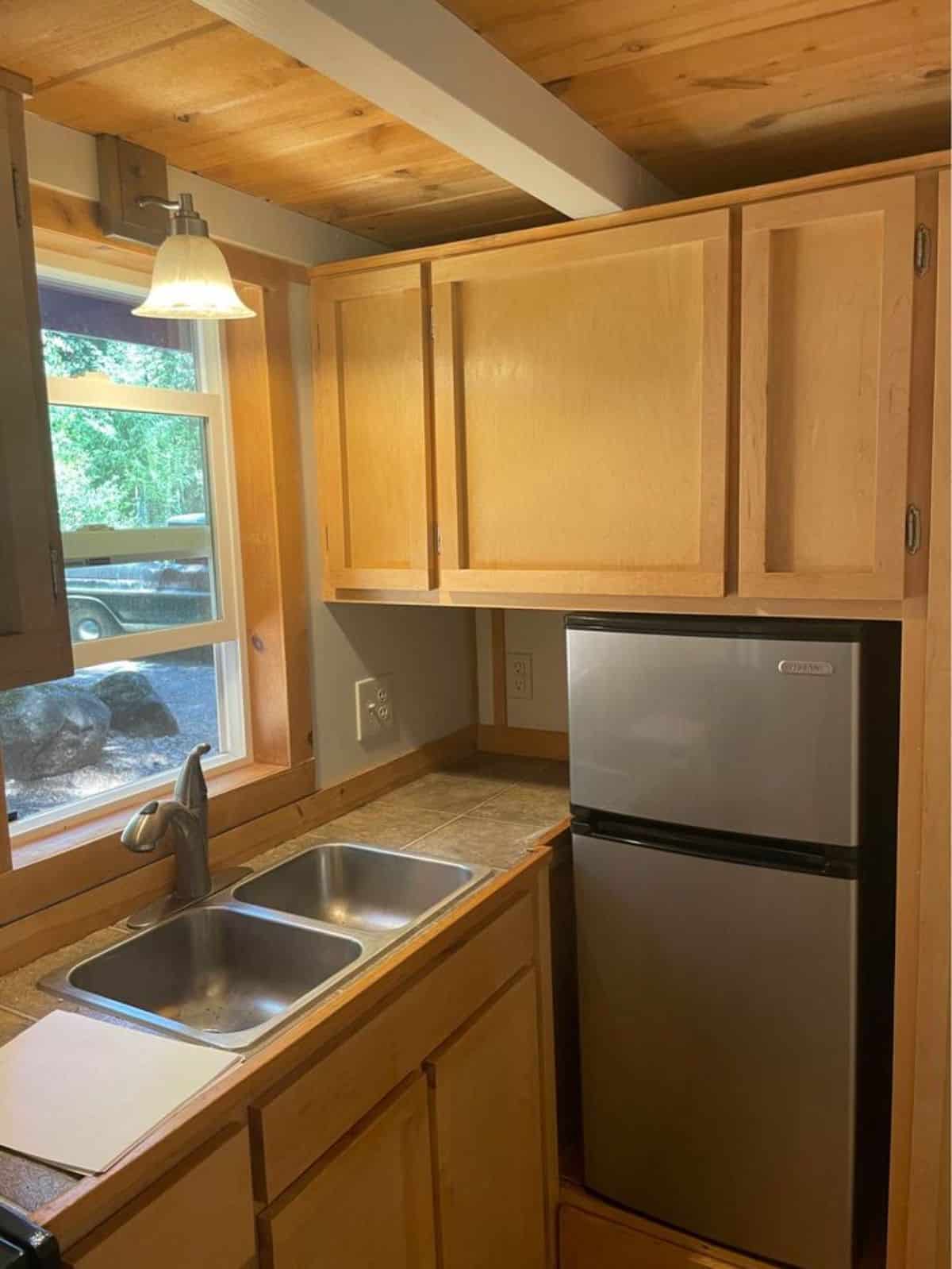 Countertop in kitchen of 27’ Tiny House With Two Lofts