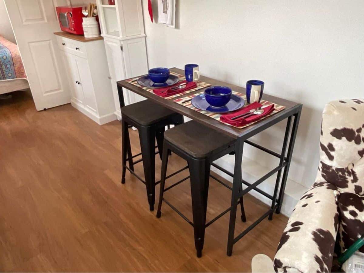 Dinning area opposite to kitchen table of 28’ Fully Furnished Tiny House
