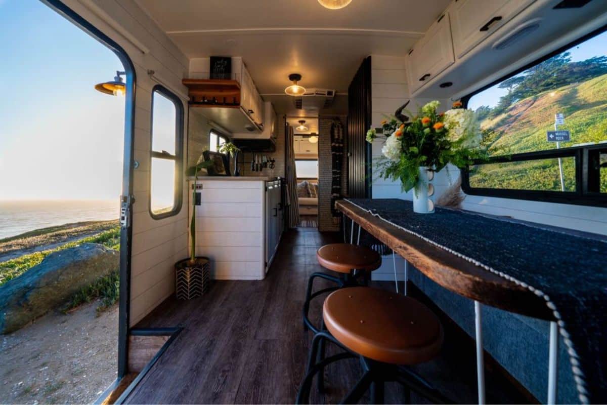 Separate dinning area of 28’ Tiny House On Wheels
