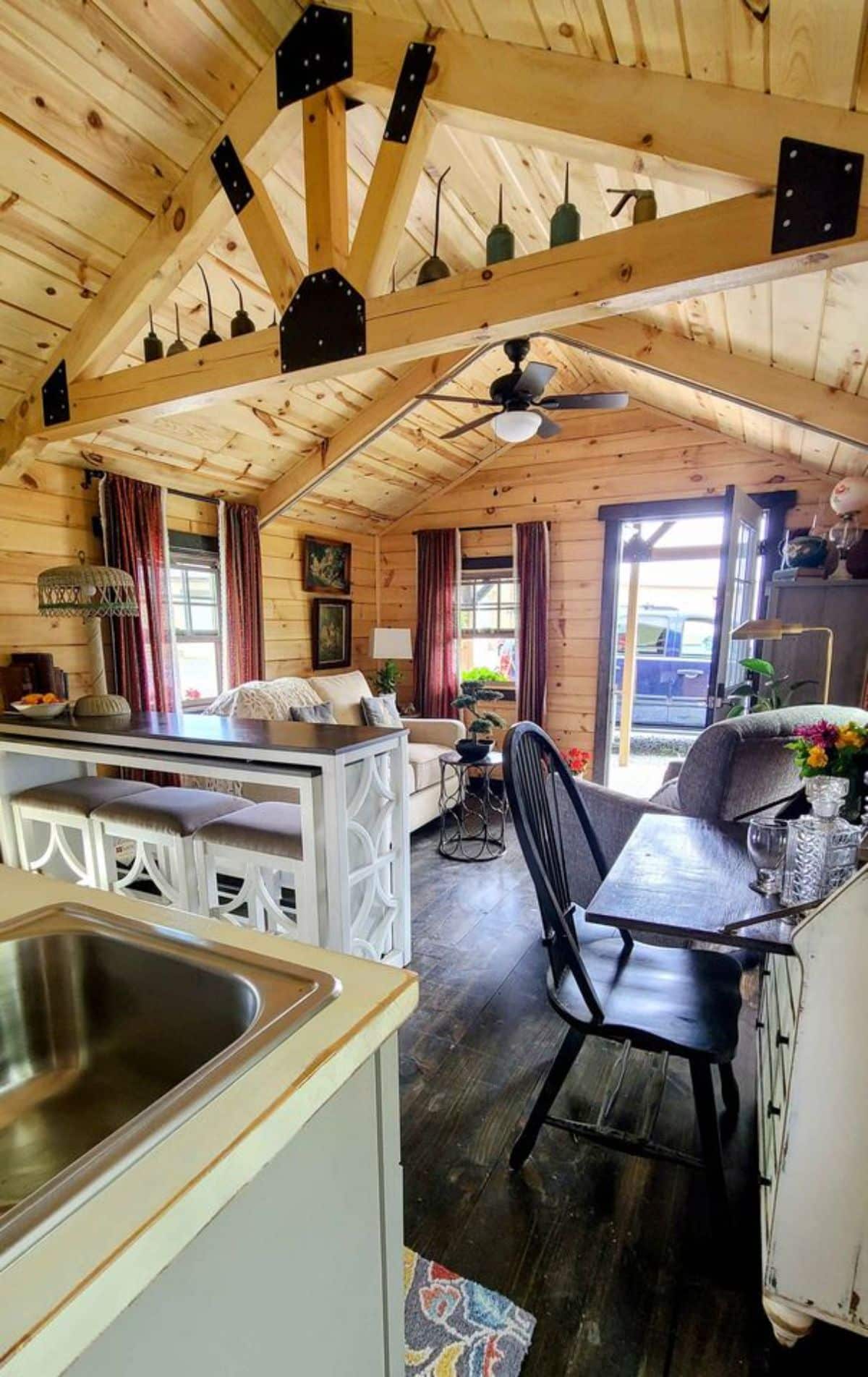 Fully insulated Wooden interiors and wooden flooring all over the 36’ Fully Furnished Log Cabin