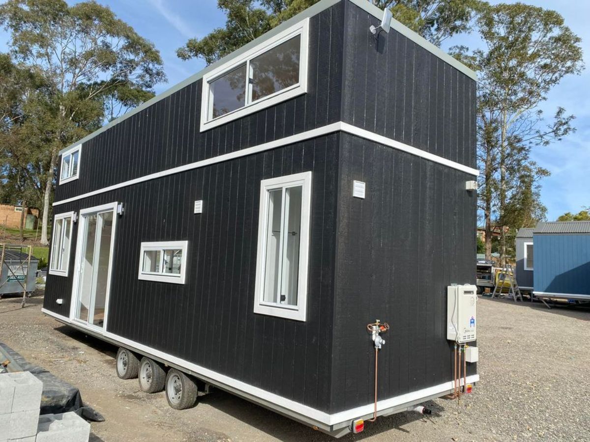 Stunning black and white exterior of Modern Two Storey Tiny Home