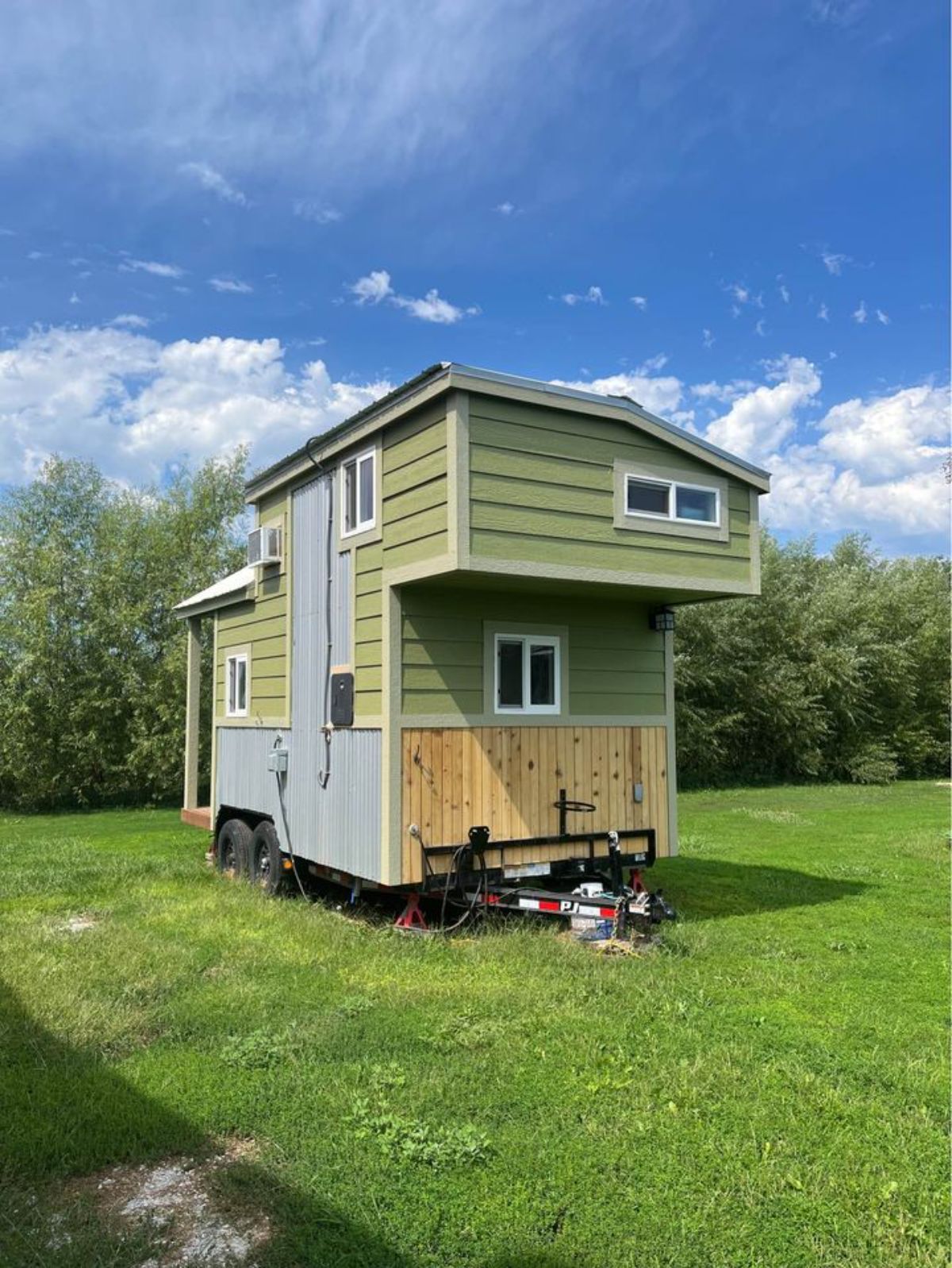 Stunning green exterior of 16' Mobile Tiny Home