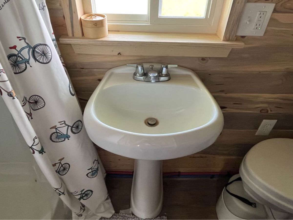 Sink in bathroom of 16' Mobile Tiny Home