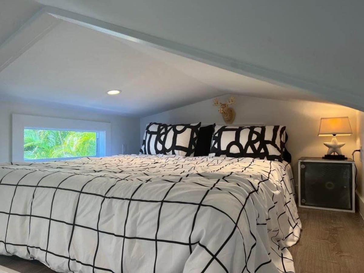 Loft bedroom is very stylish and has a queen mattress still ample space left
