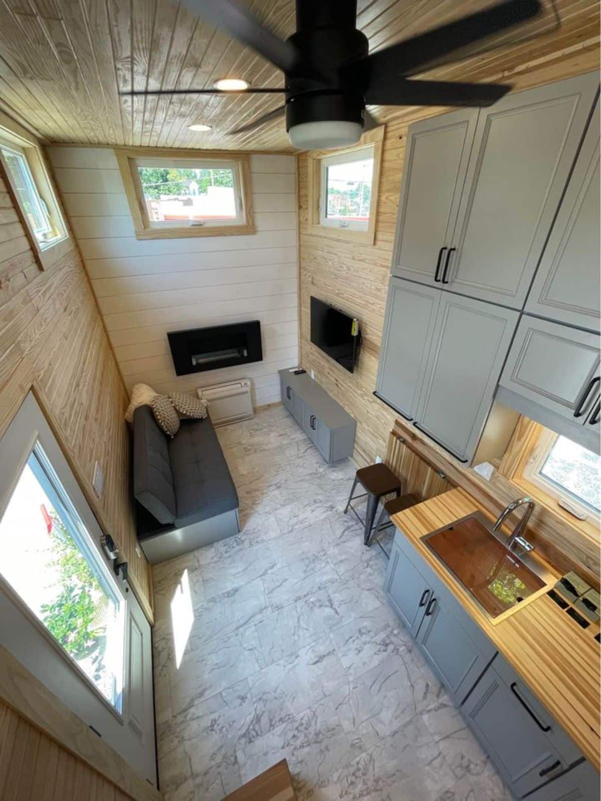 Overall view of stunning 24' Luxury Tiny House from loft view