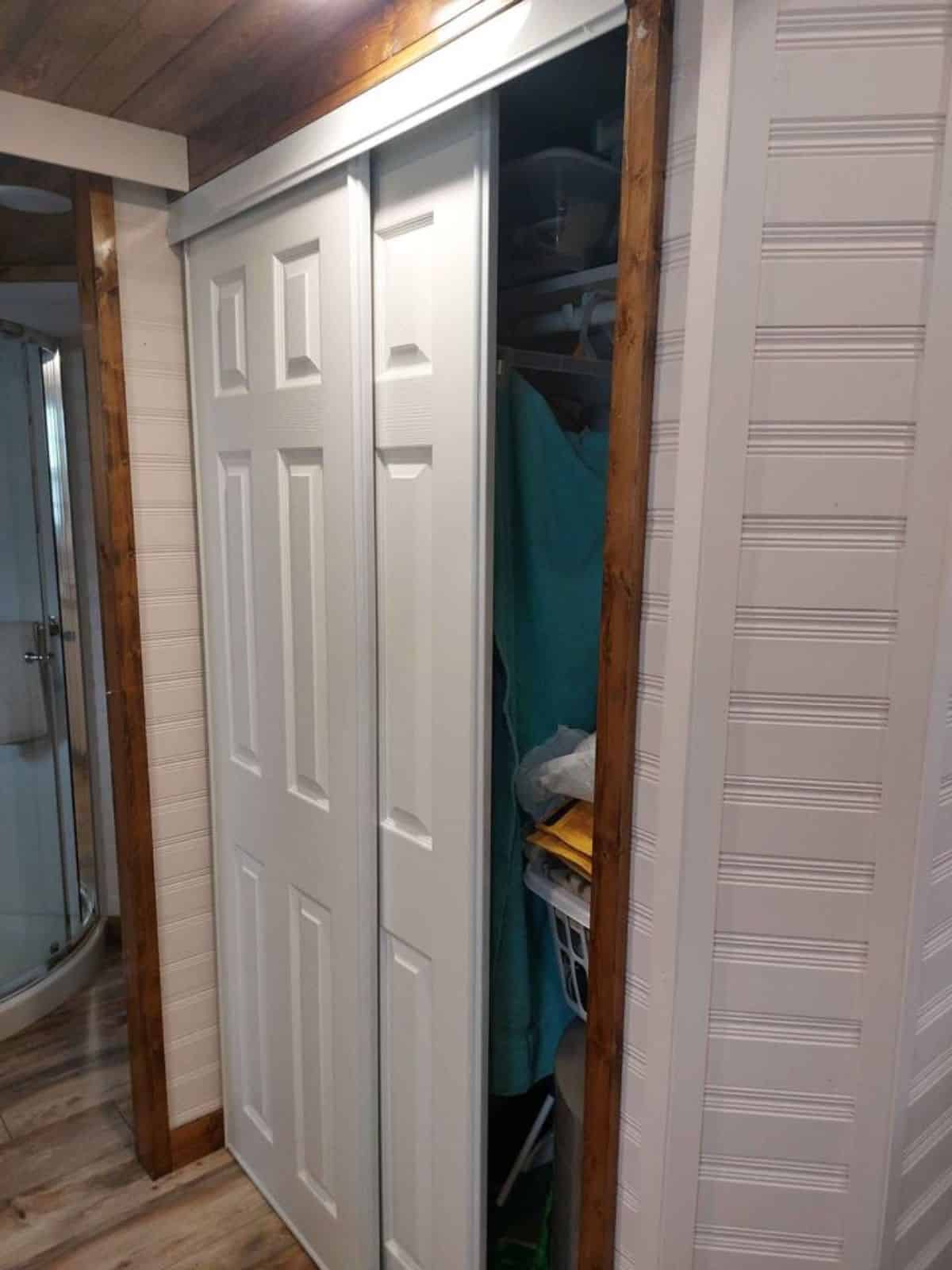 Full length closet right opposite to kitchen area